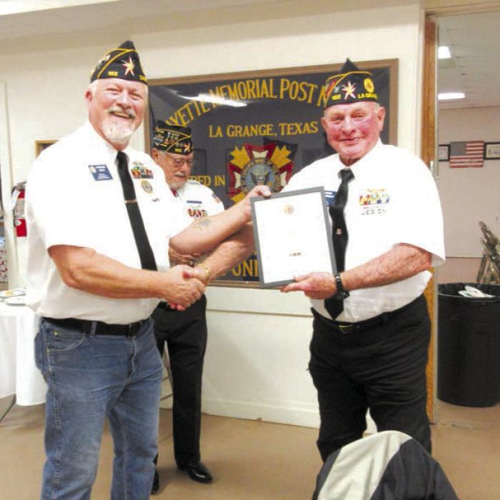 The American Legion Bronze Medal was awarded to Jim Bramblett for his work identifying veteran graves in the La Grange Cemetery by Post Commander Richard Gray.