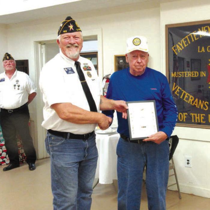 The American Legion Silver Medal was awarded to J.R. Baca for his continued work of many years as Post Financial officer by Richard Gray.