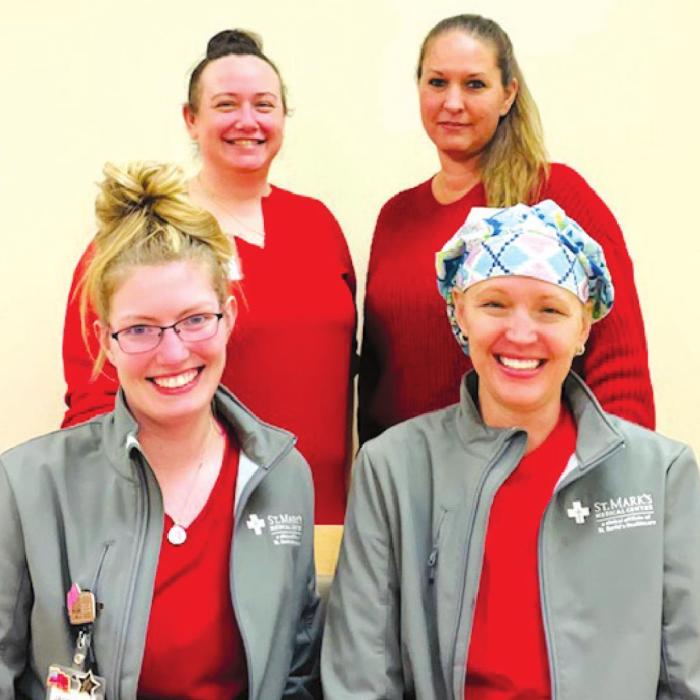 St. Mark’s Advanced Outpatient Wound Center team celebrating Go Red for Women day, front row from leftt: Jackie Faigle, FNP-C, and Stacie Schramek, RN; back row: Program Director Jennifer Scott, RN, and Katherine Logan, FDC.