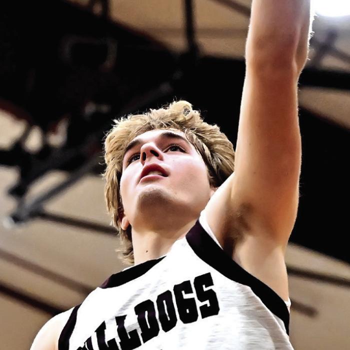 Holden Kloesel goes up for the shot Tuesday night in Flatonia where the Bulldogs defeated the Weimar Wildcats. Photo by Stephanie Steinhauser
