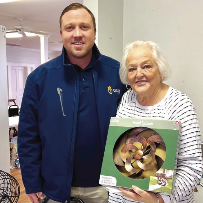 Blackout prize winner Laverne Dornak with Josh Lovejoy with Crown Hospice.