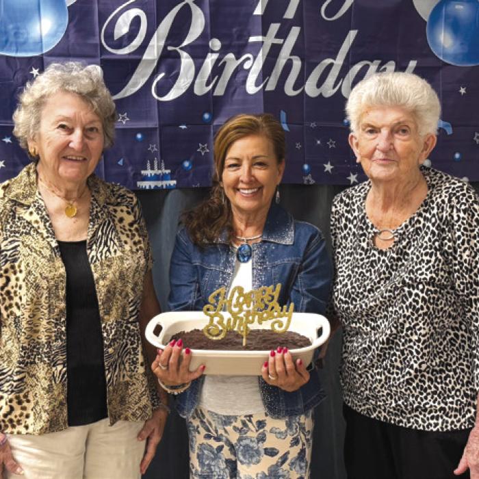 April birthday celebrants are pictured from left: Helen Janda, Martha Beckmann, and Annie May Ripper.