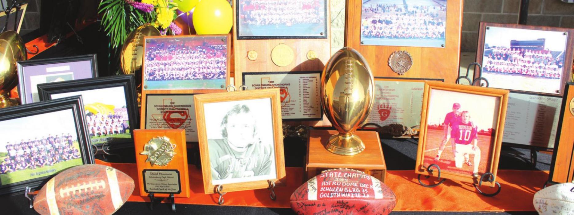Memorabilia from David Husmann’s coaching career was on display at Saturday’s ceremony.