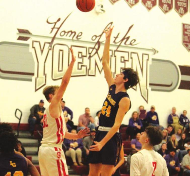 Jaxon Cooper scored on this floater on his way to a team-high 17 points Tuesday. Photo by Jeff Wick