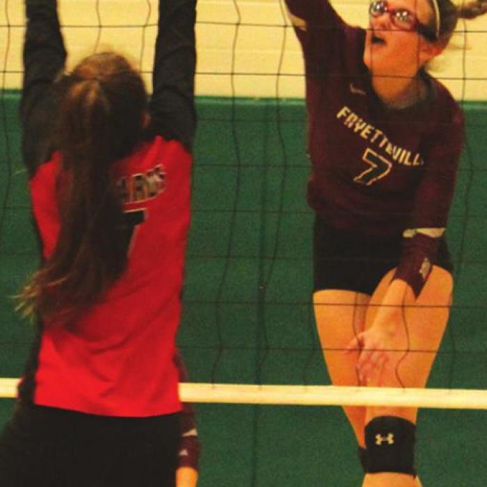 Fayetteville’s Brooklyn Jaeger spikes down one of her matchhigh 34 kills Monday against Richards.