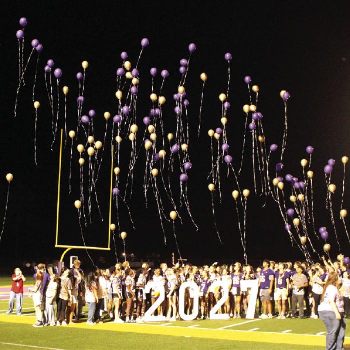 Above, left: With a flaming LG behind them, seniors stand at attention during the National Anthem at the community pep rally Wednesday. Above, right: Seniors release balloons at the conclusion of Wednesday’s pep rally. Right: At halftime of Friday’s football game, Aaliyah Cruz and Trey Brumley were crowned LHS Sweetheart and LHS Beau. More homecoming coverage on Page B1-2 today. Photos by Jeff Wick
