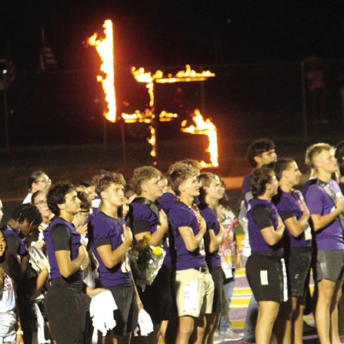 Above, left: With a flaming LG behind them, seniors stand at attention during the National Anthem at the community pep rally Wednesday. Above, right: Seniors release balloons at the conclusion of Wednesday’s pep rally. Right: At halftime of Friday’s football game, Aaliyah Cruz and Trey Brumley were crowned LHS Sweetheart and LHS Beau. More homecoming coverage on Page B1-2 today. Photos by Jeff Wick
