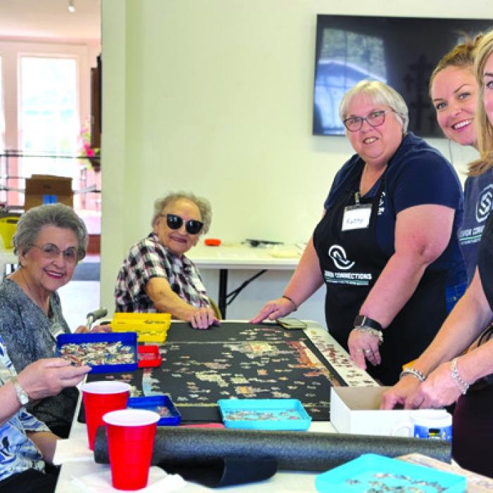 Puzzle addicts in Flatonia just won’t quit. From left: Laverne Syler, Jeanette Zouzalik, Gretchen Zapalac, and volunteers Kathy Carpenter, Kandace Dalmolin and Kitty Wilbanks.