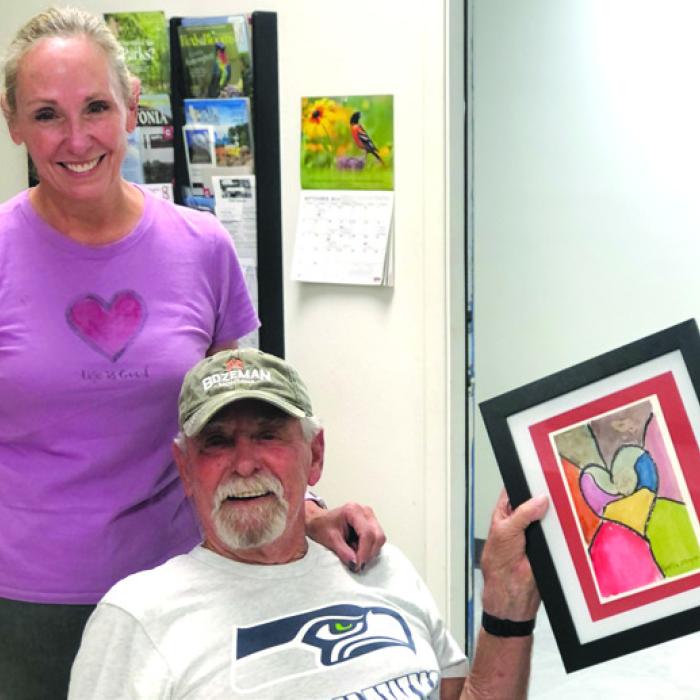 April Pierson and her dad, “Mac” Dennis Shramek, are part of the Helping Heroes team. They recently hung artwork on the gallery wall and a few other honey-dos. Come see the art made at Artful Fridays and purchase greeting cards made from the artwork.