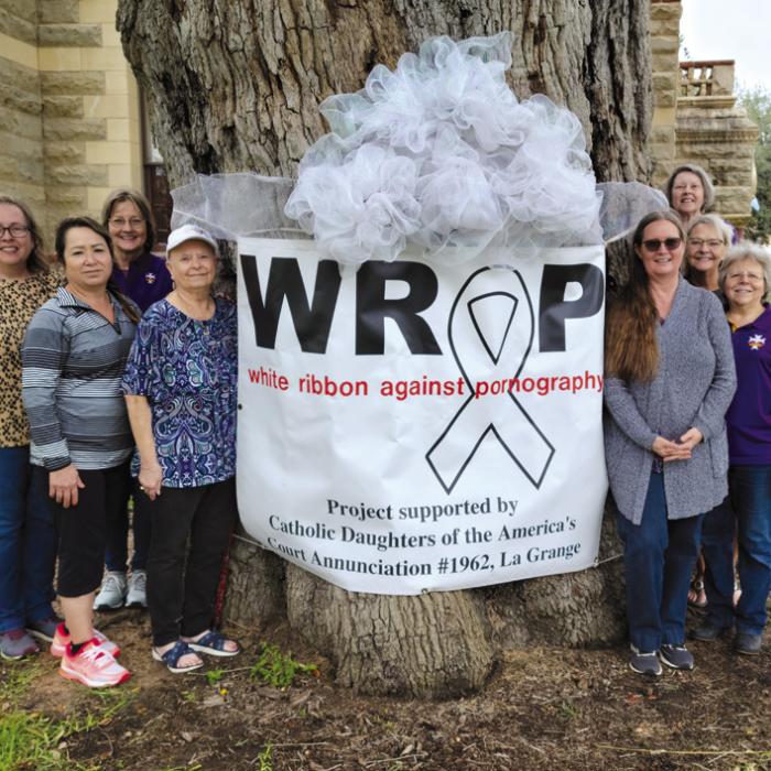 Pictured left to right is: Elizabeth Kallus, Fide Orona, Shirley Antosh, Linda Winkler, Kathy Weishuhn, Theresa Mueller, Cynthia Novak; back: Marilyn Kothmann.