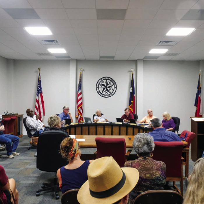 A big crowd attended the Schulenburg City Council meeting Monday night, Aug. 3, as City leaders decide how to proceed with the downtown city hall renovation project. Last month, the Council voted to go after $8 million in certificates of obligation to fund the project. But a petition to force a bond election on the matter has now been filed. Photo by Andy Behlen
