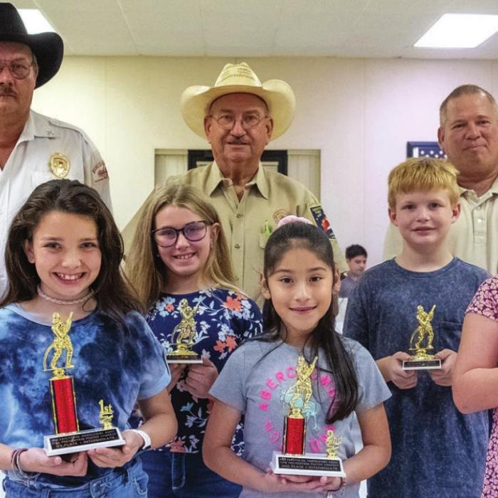 Fire poster contest winners for 3rd and 4th grade are (front, from left) first place - Morgan Williams of Round Top, second place - Giah Garcia of La Grange, third place - Brynlee Berger of Schulenburg, (middle) third honorable mention - Lynn Lemus of La Grange, second honorable mention - Kirtley Kallus of La Grange, first honorable mention - Slade Mozisek of La Grange, (back) Keith Burcalow, Randy Noviskie and Kenneth Chovanec of the Fayette County Firefighters Association.