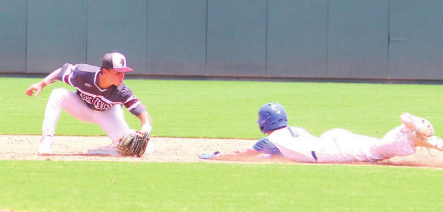 Fayetteville shortstop Travis Gully is ready and waiting to tag this runner out trying to steal.