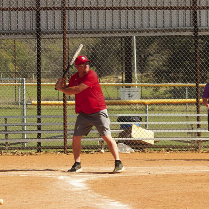 Several parents got together and hosted a youth fun day at the fairgrounds softball fields Saturday morning. Here are some images of the fun, that included huge inflatable rolling balls that kids could climb into, left, and a kids vs. parents home run derby, right. Photos by Jeff Wick