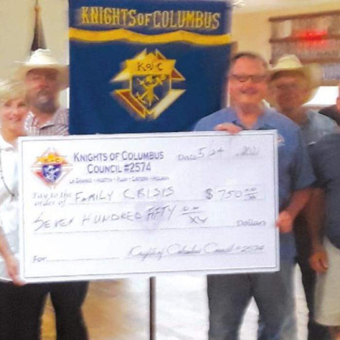 KCs Donate to Family Crisis Center