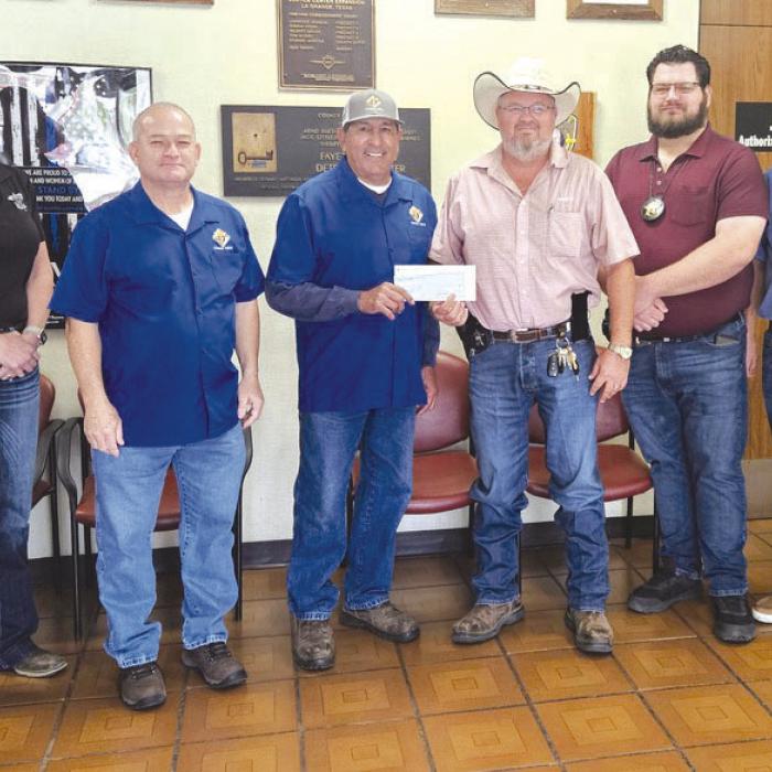 The Knights of Columbus Chromcik Council No. 2574 presented a $500 donation to the Fayette County Sheriff’s Office Deputy Santa Program. Pictured from left is: Angela Lala, Marcus Recek, Hector Cervantez (Grand Knight), David Beyer, Jeremy Castleberry, and Garry Schellberg.