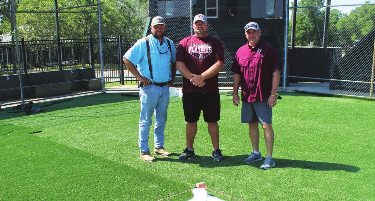 Members of the Fayetteville Baseball Alumni Association, which has spear-headed the turf project and now manages the ballpark, left to right: Daniel Schley, Josh Vitek and Mark Schmitt.