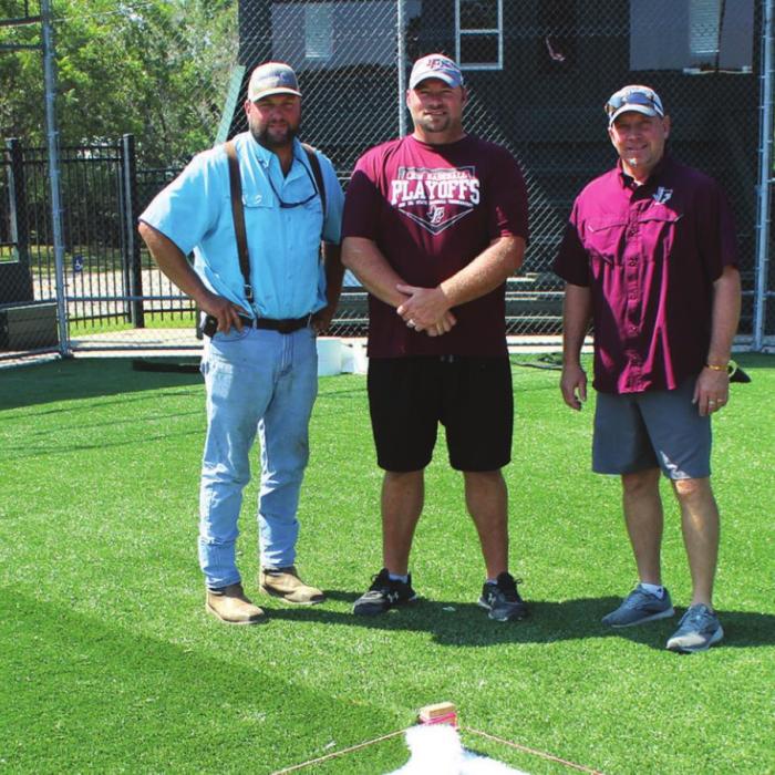 Members of the Fayetteville Baseball Alumni Association, which has spear-headed the turf project and now manages the ballpark, left to right: Daniel Schley, Josh Vitek and Mark Schmitt.