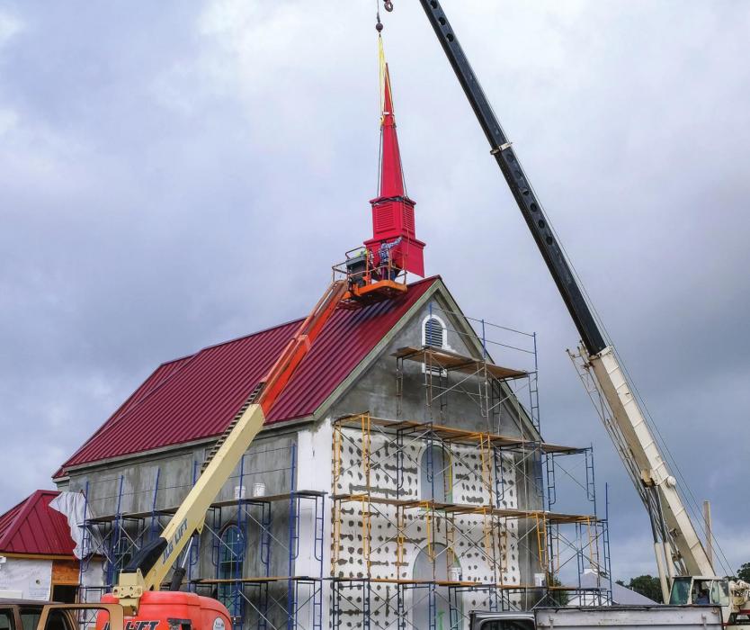 Steeple Goes Up at Replica Czech Church