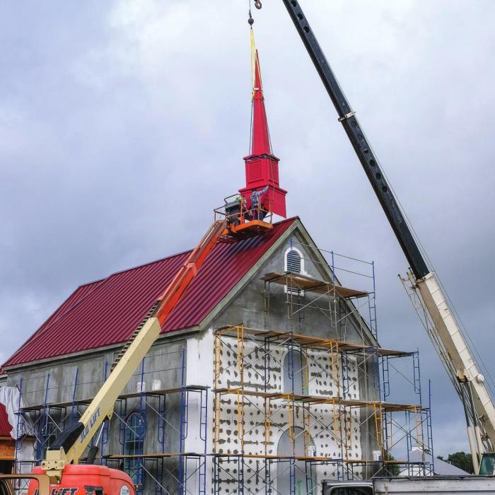 Steeple Goes Up at Replica Czech Church