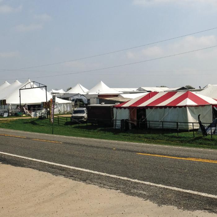 Tents are popping up across northern Fayette County as vendors get ready for the 2025 Spring Antiques Show. The Bar W Field in Warrenton, pictured above, was busy with activity on Friday, March 14. A few venues were already trading last weekend. Many of the venues officially open this weekend, some as early as Thursday. The spring show will be fully underway next week through the first weekend in April. Photo by Andy Behlen