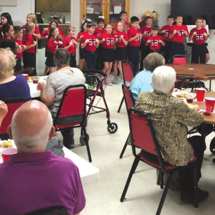 Navidad Valley Community Connections senior members enjoyed the St. Rose Singers during their Thanksgiving luncheon.