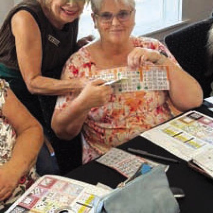 Volunteer Debbie Lincke and Bingo winner Annette Richard.