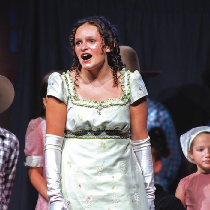 Hannah Garza sings a solo during Friday’s performance.