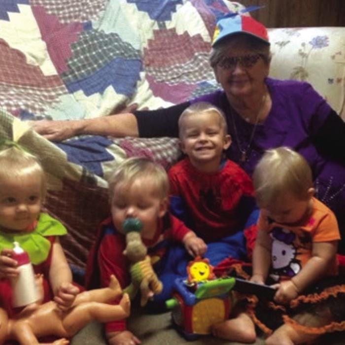 Tracy Svrcek with kiddos she watched years ago.