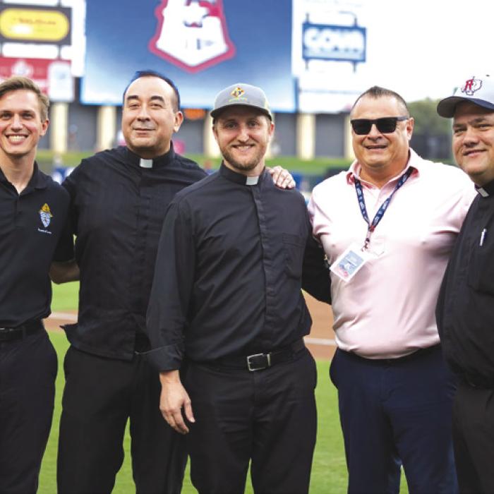 Fr. Brian Phillips, the former priest at Sacred Heart in La Grange and now at St. Margaret Mary Catholic Church, threw out the first pitch at the Round Rock Express minor league baseball game Friday as Catholics from across the Diocese of Austin gathered for an evening of baseball, fellowship, and fun.