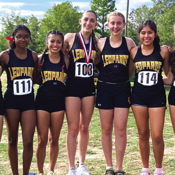 The members of the Lady Leps varsity cross country team pose after their district meet last week. Individual medalists for the Lady Leps were: Eleanor Carey (4th, far right), Faith Greenwood (8th, fourth from left). Other team members included: Alley Olvera, CeCe King, Hannah Gross, Abril Garcia and Brisa Soto.