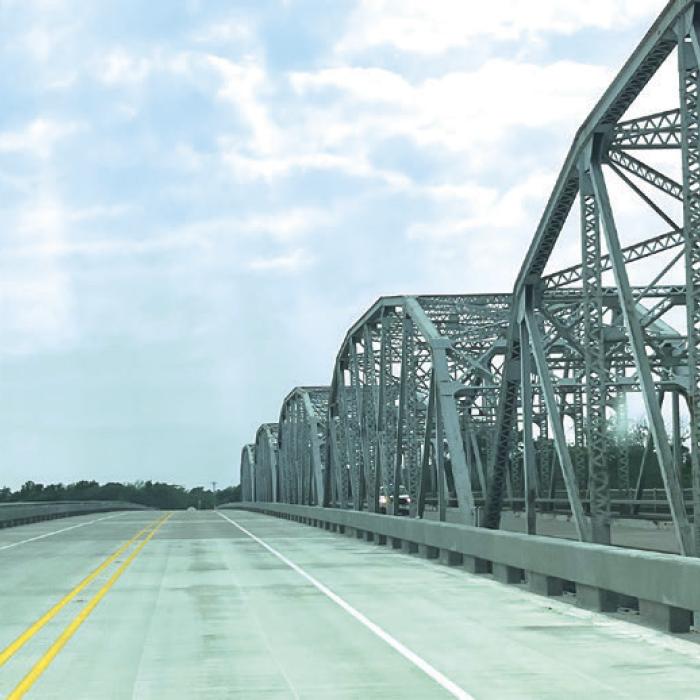 After years of construction, the new Business Highway 71 Bridge in La Grange was opened Monday. It sits next to the old one, right, which will be rehabbed and put back in use for one-way traffic.