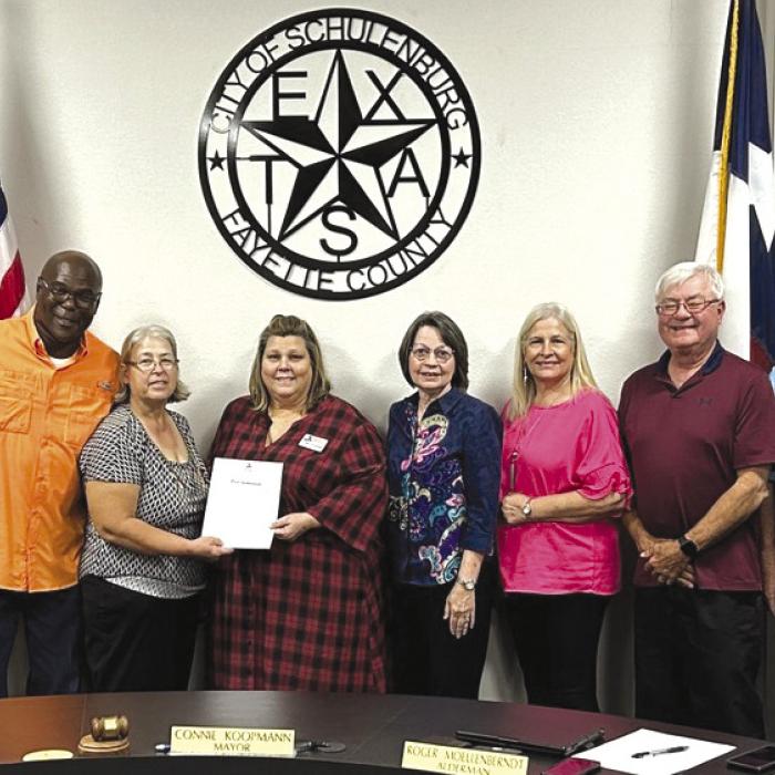 Pictured from left: Tami Walker City Administrator, Greg Thomas-Council, Mayor Connie Koopmann, Karen Hoskins of PAT, Helen Neisner (PAT Board), Kathy Kleiber-Council, Roger Moellenberndt-Council, Clarence Ahlschlager-Council.