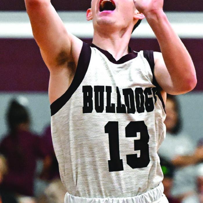 Luke Law gets the score for Flatonia on Tuesday night as the Bulldogs extend their winning streak. Photo by Stephanie Steinhauser