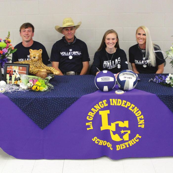 La Grange High School volleyball star Lanie Doyle signed her paperwork Wednesday to play collegiate volleyball at the University of Dallas. She is shown here with her family members at the signing ceremony, left to right, her brother Sutton Swinburn, father Scott Doyle, Lanie Doyle and mom Joell Doyle. The University of Dallas is a NCAA Division III school that competes in the Southern Collegiate Athletic Conference.