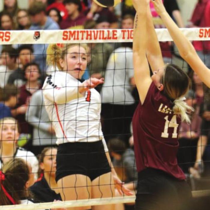 Kloe Kutac spiking a ball in Monday’s playoff match.