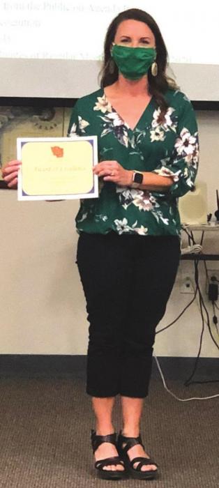 School nurse Kari Willrich was recognized by the LGISD board for her willingness to go the extra mile during the COVID-19 shutdown.