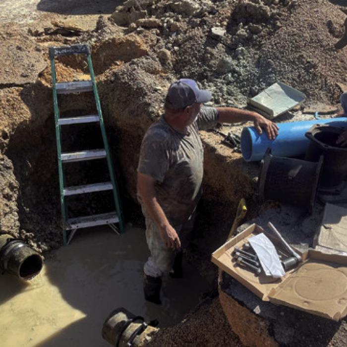 City of Fayetteville workers replaced a three-foot section of water main that broke Saturday morning just as the town’s Lickskillet celebration was getting underway. A boil water notice remained in place until early Tuesday morning. Photo by Craig Moreau, Fayetteville Emergency Management Coordinator