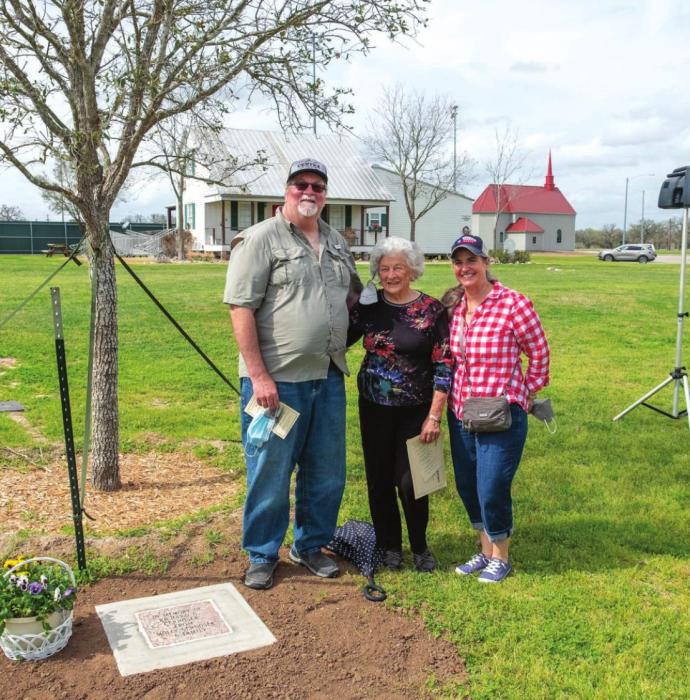 One of the six trees was dedicated in honor of the late Richard Cernosek of La Grange. Pictured beside the tree are his children and widow: Chris, Molly and Carmen Cernosek. Photos by Andy Behlen