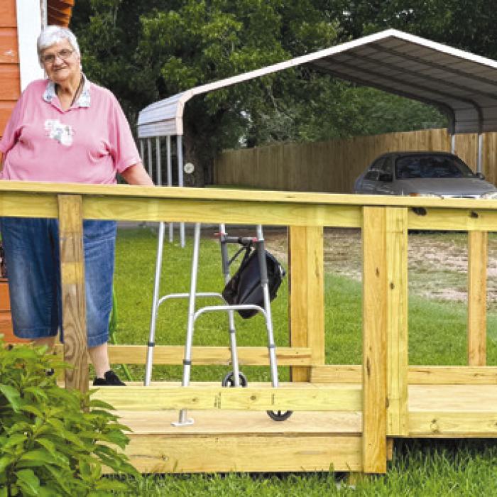 Senior Connections member Cynthia Meyer is pictured here with her new ramp by Texas Ramp Project of Fayette County. A representative from the organization held a presentation for Senior Connections and within a months time she was safely getting in and out of her home.