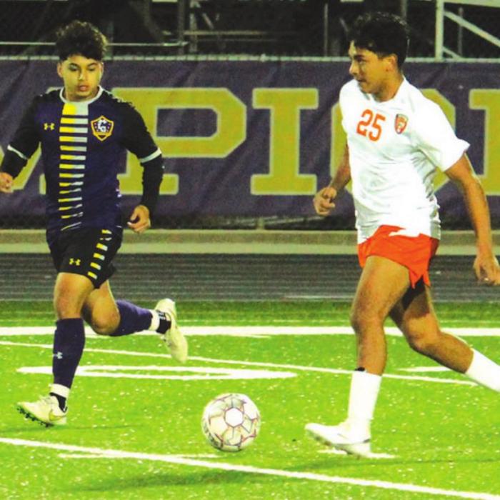 La Grange’s Salvador Aguirre-Cardenas, left above, scored three goals in the boys 4-0 win over Smithville Tuesday.