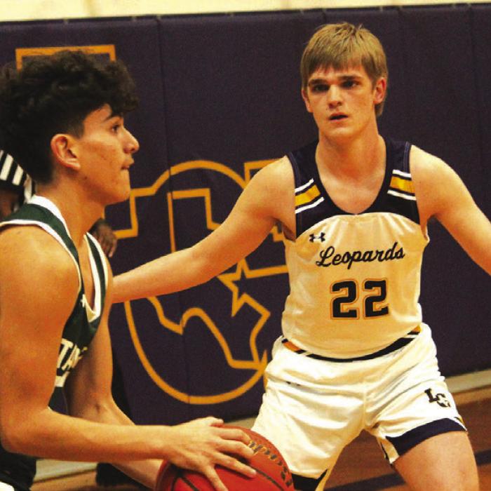 La Grange’s Ty Trlicek playing defense in Tuesday’s game against Taylor. Photo by Jeff Wick