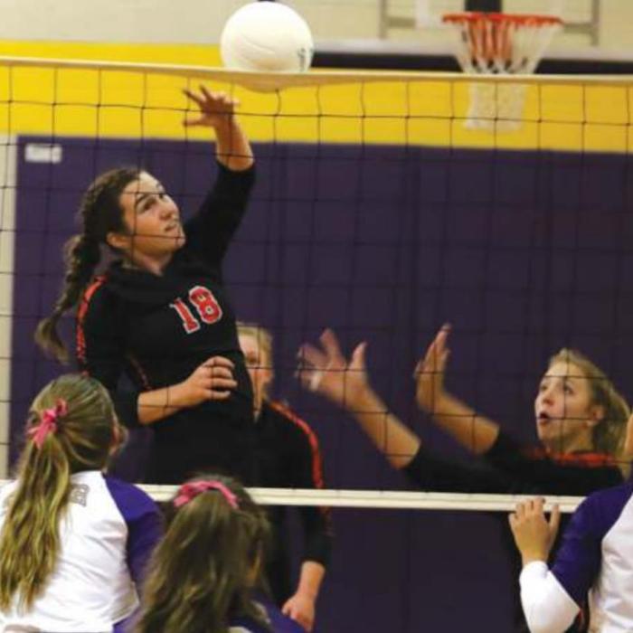 Schulenburg’s Morgan Marburger spikes a ball in last Friday’s victory over Shiner. Photo by Audrey Kristynik