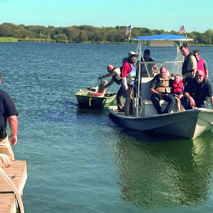 Four Saved After Their Boat Flips at Lake Fayette