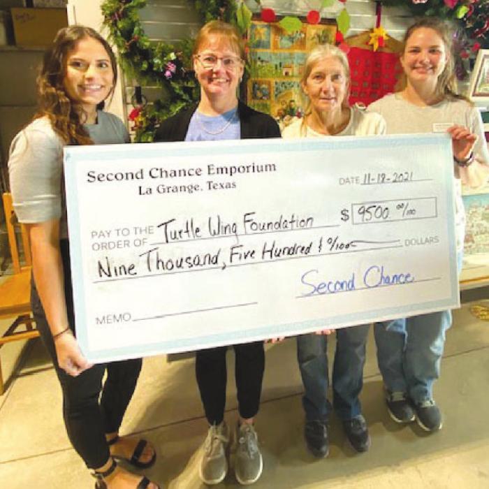 Pictured from left is: Destiny Psencik, Turtle Wing Foundation Executive Director; Nancy Hajek, Second Chance Emporium Church Coordinator; Gayle Schielack, Second Chance Emporium Store Director; and Julia Thomas, Second Chance Emporium Assistant Store Director.