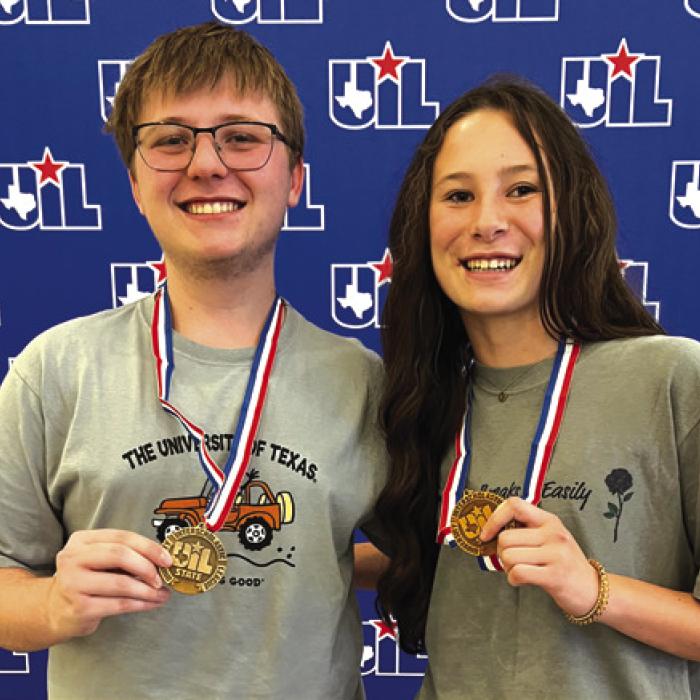 Two La Grange High School students earned medals at the state UIL Academic Meet in Austin last week. Eleanor Carey, right, placed 4th in state in individual Literary Criticism. She is coached by Laurie Stork. Landon von Minden, left, was 4th place individual in Computer Applications. He is coached by Tara Bennett.