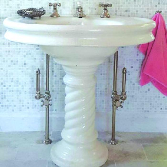 This oval earthenware sink with the twisted pedestal was in our house in Rhode Island.