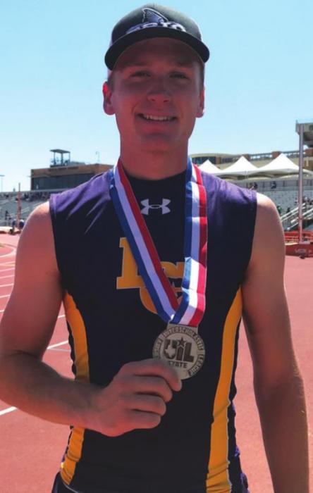 La Grange’s Dylan Truss holds up his state silver medal.