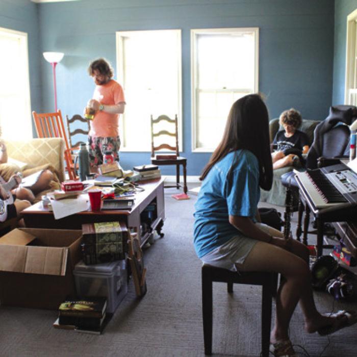 Students assigned to play instruments during the plays practice together their music together