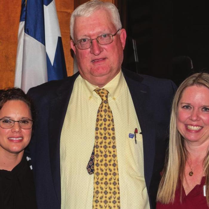 The La Grange Chamber of Commerce Hall of Fame Award with to Lee Fritsch. Presenting the award were Chamber Operations Director Jamie Fabre (left) and Chamber Board Chairwoman Mindy Davis (right).